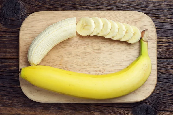 Banana and a sliced — Stock Photo, Image