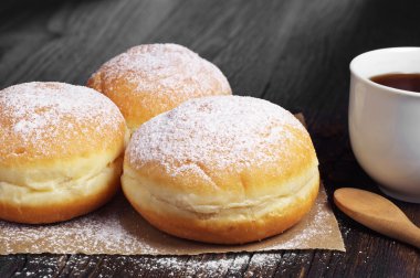 Berliner donuts and coffee cup