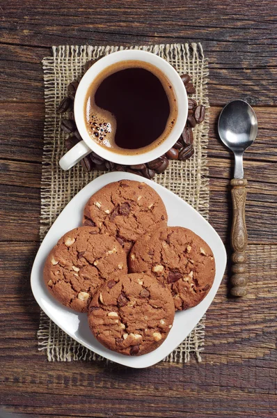 Schokoladenkekse und Kaffee Stockbild