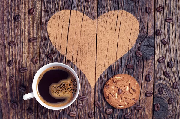 Kaffee, Kekse und Herz lizenzfreie Stockbilder