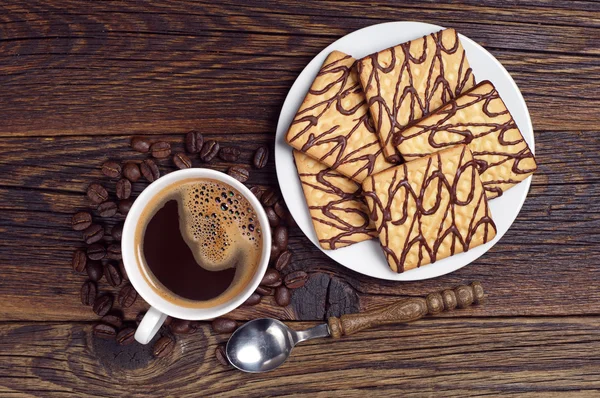 Schokoladenkekse und Kaffee lizenzfreie Stockfotos