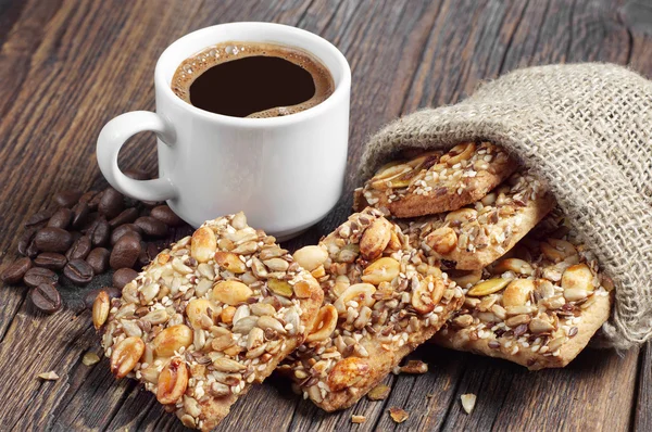 Coffee and cookies with different nuts — Stock Photo, Image