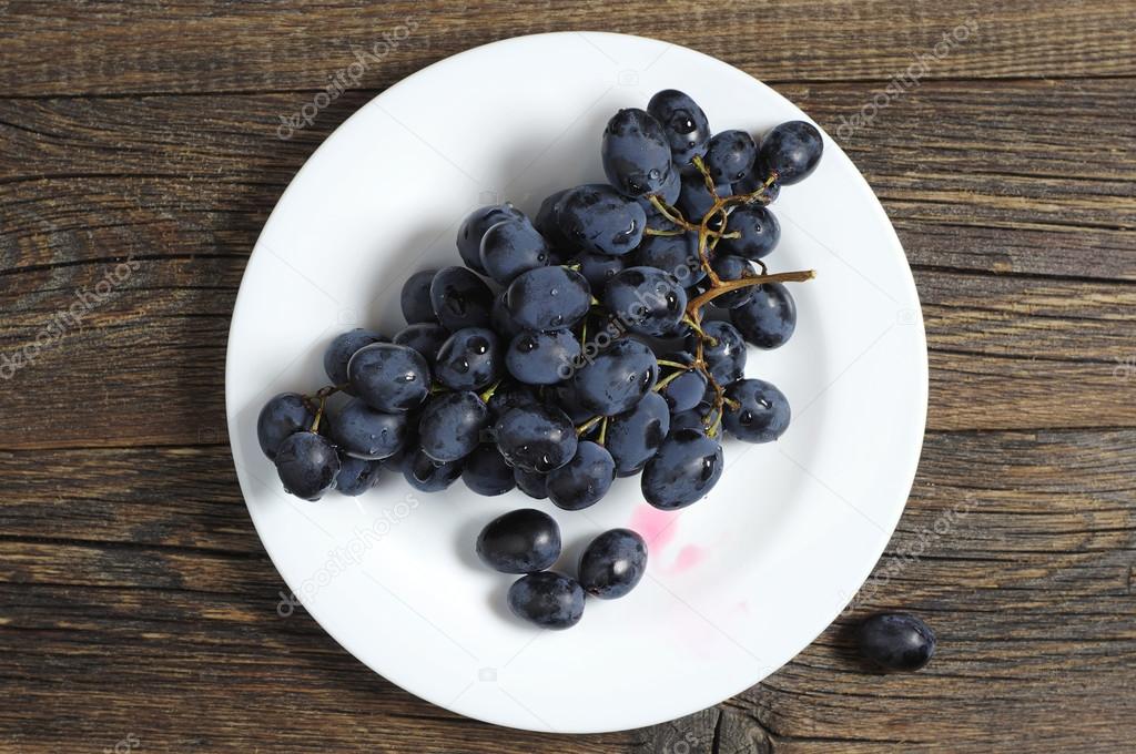 Ripe grapes in plate