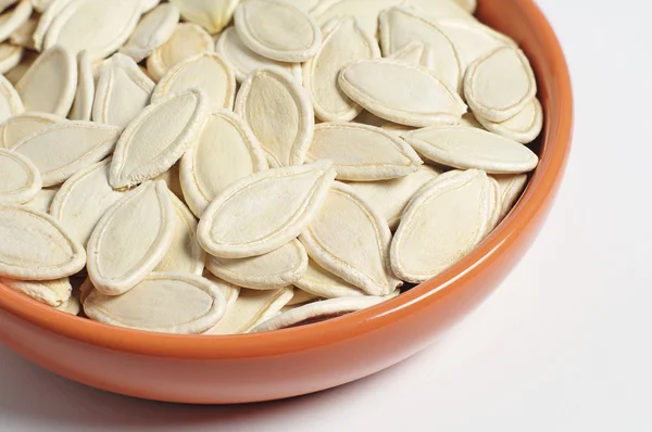 Semillas de calabaza en tazón — Foto de Stock