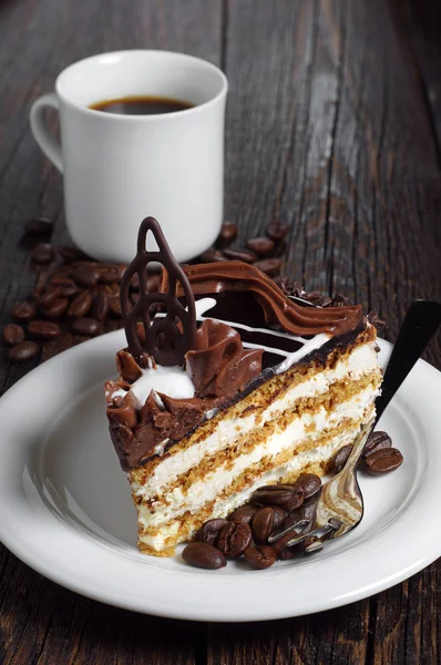 Pedaço de bolo de chocolate e café — Fotografia de Stock