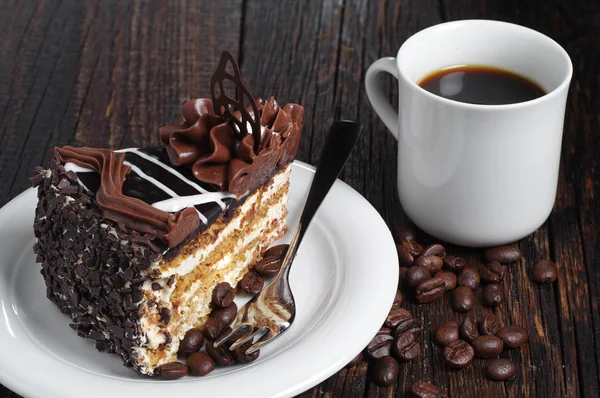 Pedaço de bolo de chocolate e café — Fotografia de Stock