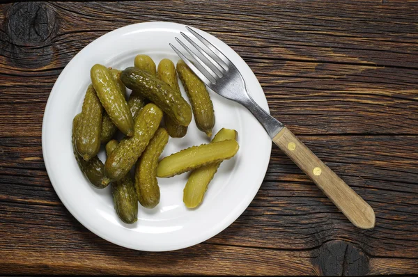 Pickled cucumbers in plate — Stock Photo, Image