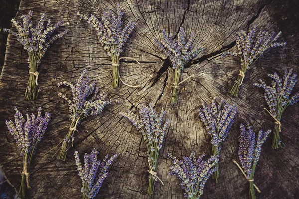 Lavender flower bunch on wood — Stock Photo, Image