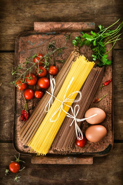 Pasta with ingredients — Stock Photo, Image