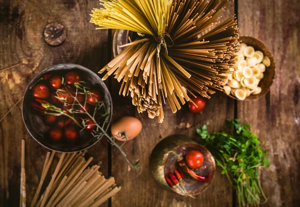 Pasta with ingredients — Stock Photo, Image