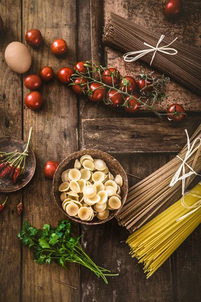 Pasta with ingredients — Stock Photo, Image