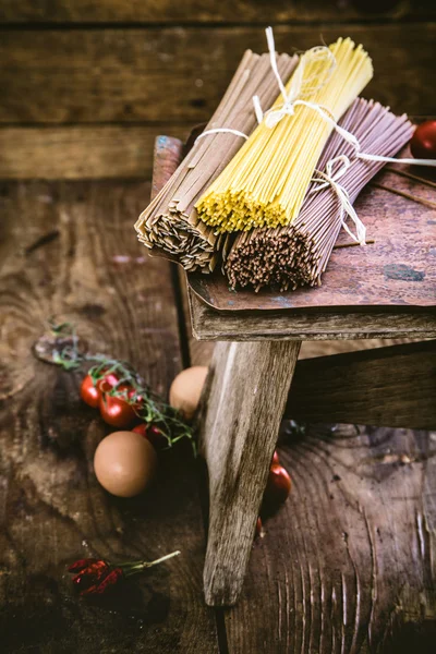 Pasta with ingredients — Stock Photo, Image
