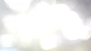 Hareketli bokeh ışıklar - arka plan için soyut animasyon - yatay geçiş ışık disklerin sağdan - renkli animasyon yavaş aşağı - beyaz, pembe, kırmızı, yeşil, gri pastel renkler yaptı.