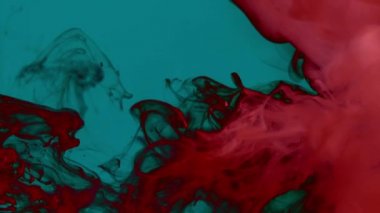 Parlak kırmızı soldan hareket, zarif volüt oluşturma, sağdaki alanı dolduran koyu turkuaz arka plan üzerinde duman