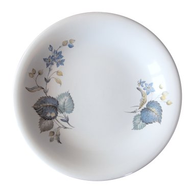 Boş bir şekilde dekore edilmiş plaka üzerinde beyaz izole