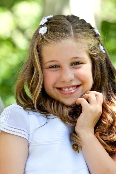 Menina em seu primeiro dia de comunhão — Fotografia de Stock