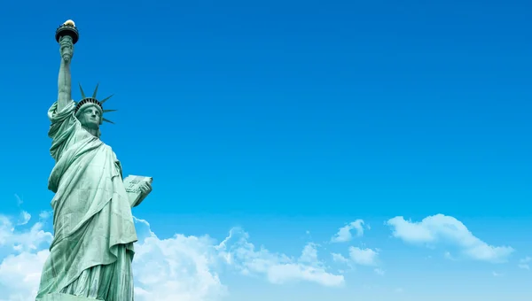 The Liberty Statue with blue sky — стокове фото