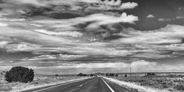 Car on the road ahead — Stock Photo, Image