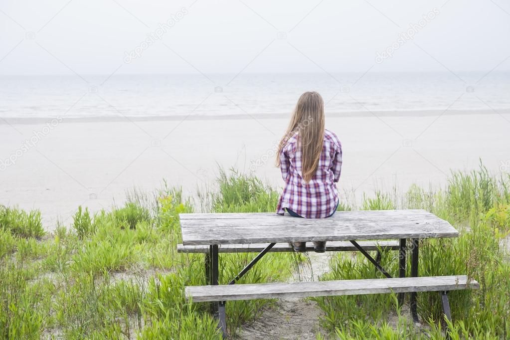 Young girl on beach — Stock Photo © elenathewise #72979267