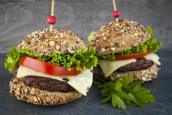 Two gourmet hamburgers — Stock Photo, Image