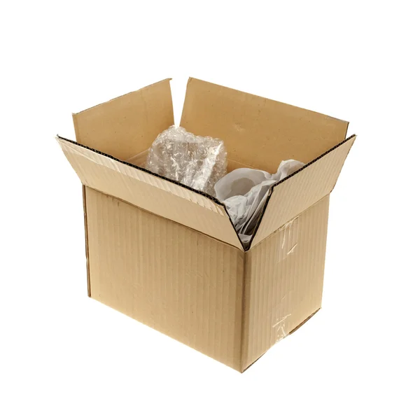 Картонная коробка с упаковкой — стоковое фото