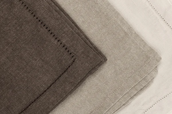 Edges of linen cloth napkins — Stock Photo, Image