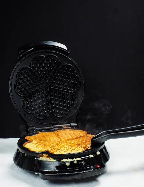 Person making fresh waffles — Stock Photo, Image