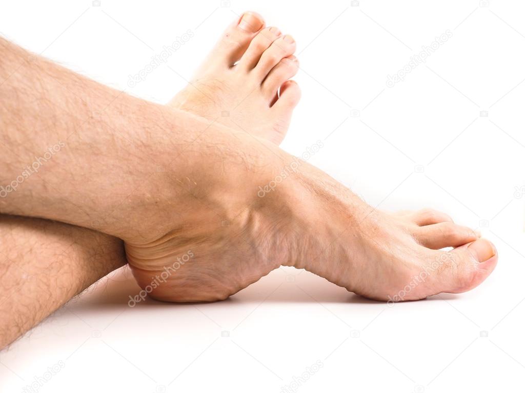 Hairy legs and feet of male person