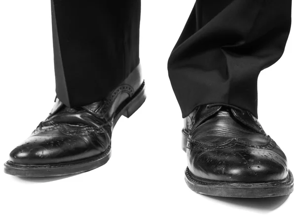 Masculine suit wearing black shoes Stock Image