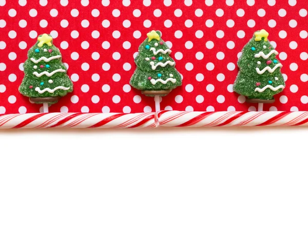 Kerstmis achtergrond met snoepjes — Stockfoto