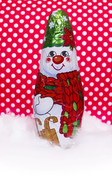 Шоколадный снеговик в шарфе — стоковое фото