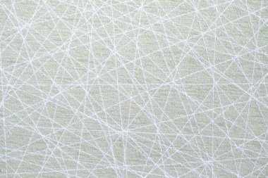 Kumaş, düz çizgili beyaz iplikleri olan bir dikiş makinesine dikilmiştir. Oda jpeg, düzenleyicide düzenleme yapmadan.