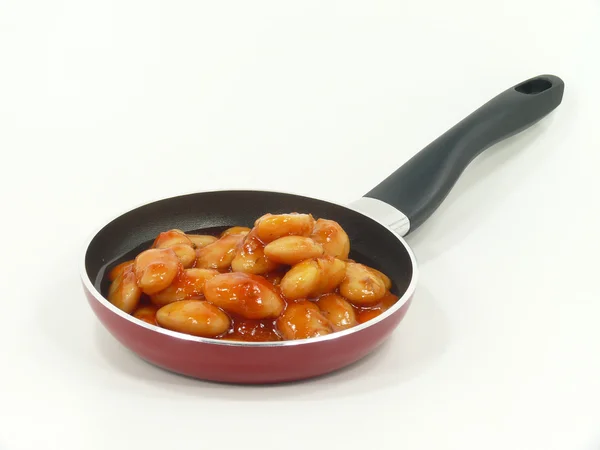 Jack fasulye tavada domates sosu içine — Stok fotoğraf