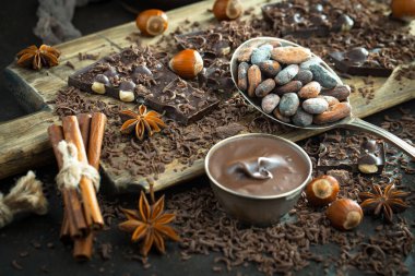 Cocoa beans on old background