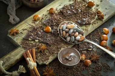 Cocoa beans on old background