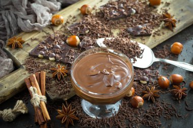 Cocoa beans on old background