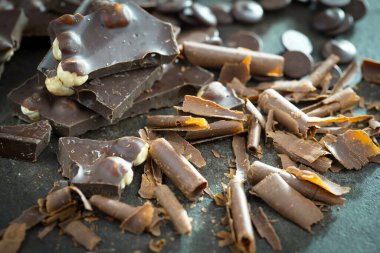 Cocoa beans on old background