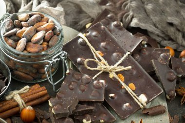 Cocoa beans on old background