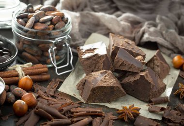 Cocoa beans on old background