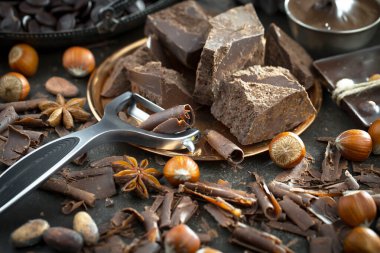 Cocoa beans on old background
