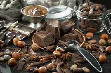 Cocoa beans on old background