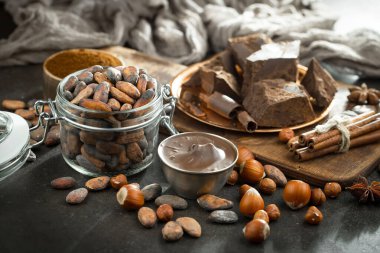 Cocoa beans on old background