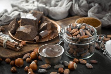 Cocoa beans on old background