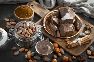 Cocoa beans on old background