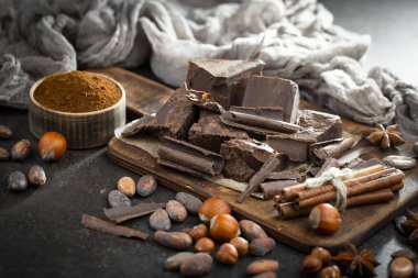 Cocoa beans on old background