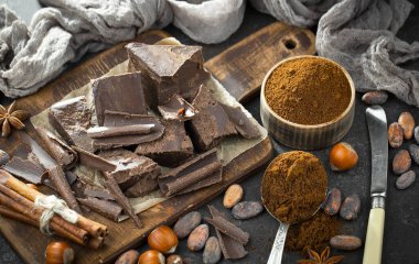 Cocoa beans on old background