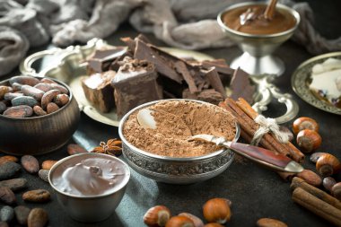 Cocoa beans on old background