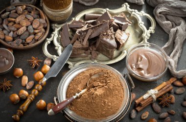 Cocoa beans on old background