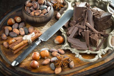 Cocoa beans on old background