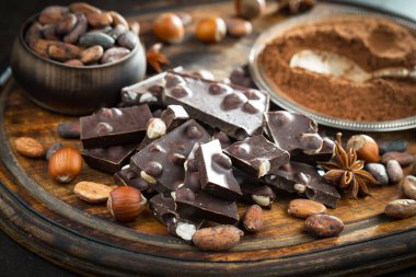 Cocoa beans on old background